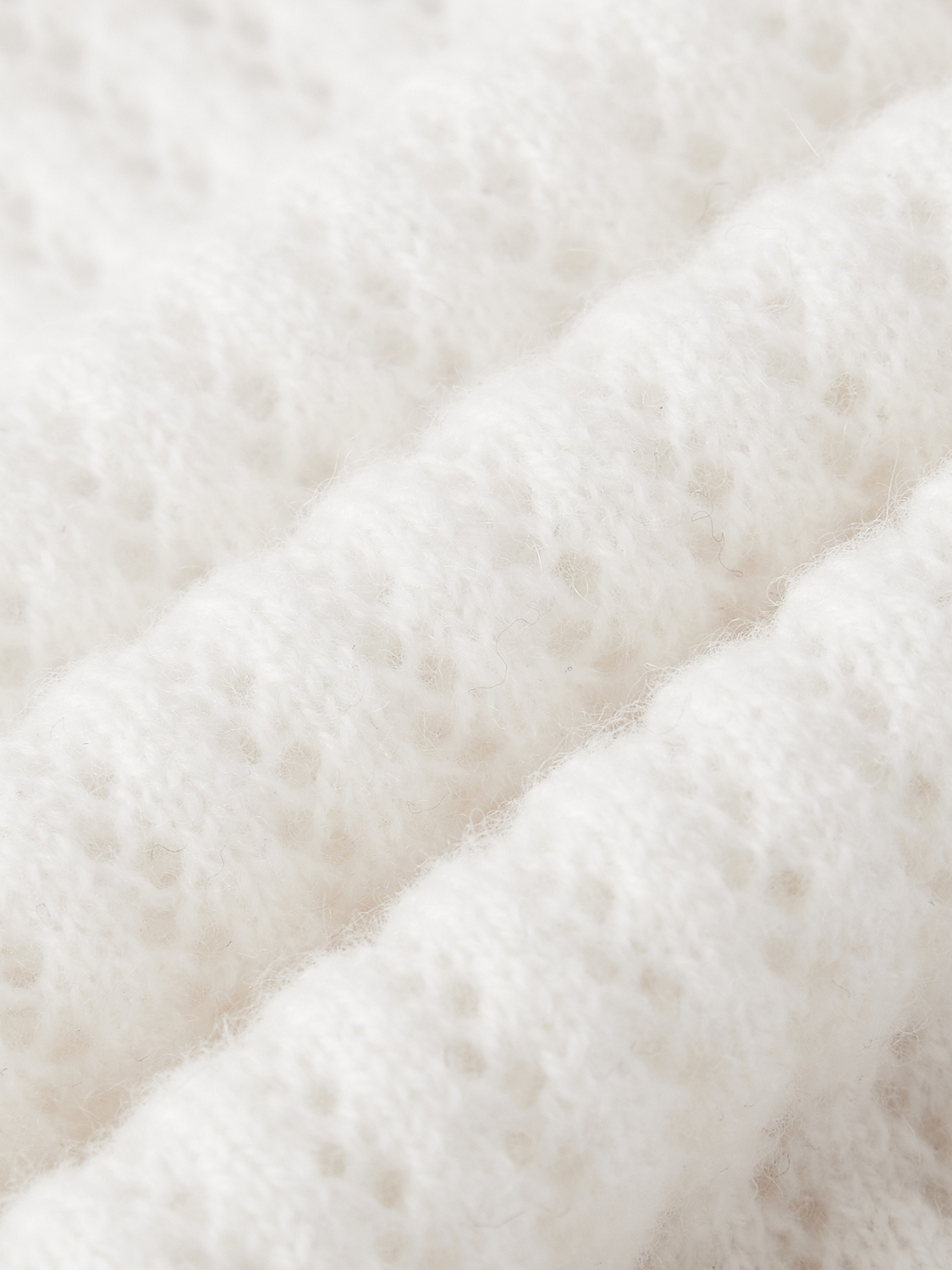 Augusta open gebreide polo van wol en cashmere voor dames in crème – Issu & Lloyd