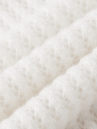 Augusta open gebreide polo van wol en cashmere voor dames in crème – Issu & Lloyd
