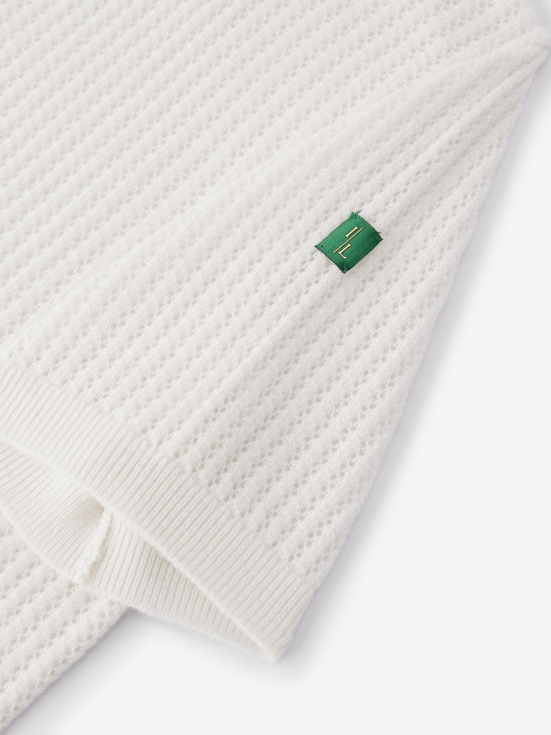 Augusta open gebreide polo van wol en cashmere voor dames in crème – Issu & Lloyd