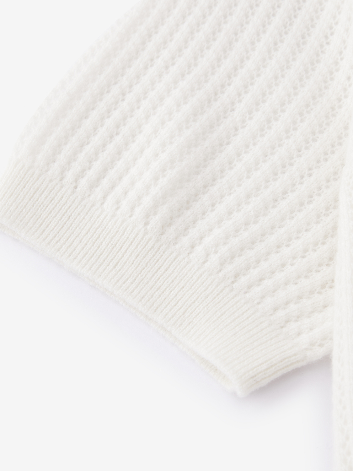 Augusta open gebreide polo van wol en cashmere voor dames in crème – Issu & Lloyd