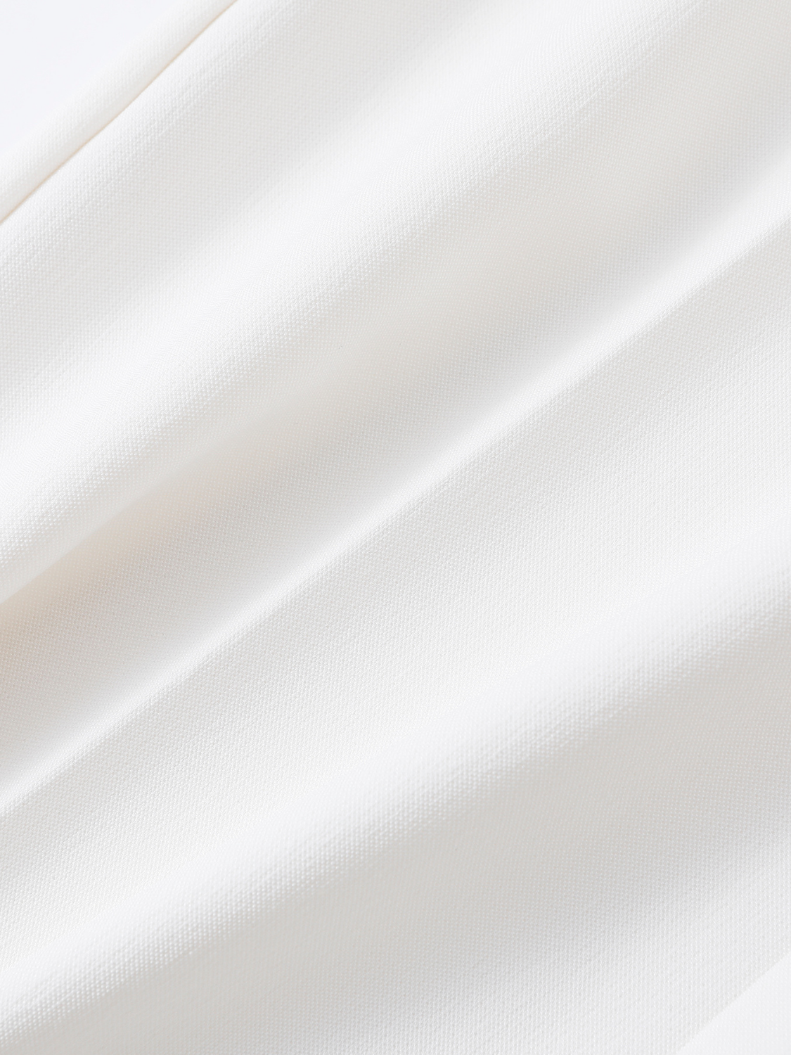Daphni pantalon met plooien en flared pijp voor dames in crème – Issu & Lloyd